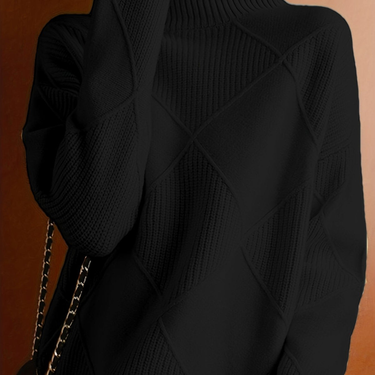 Women's textured knit turtleneck sweater with a relaxed, roomy fit