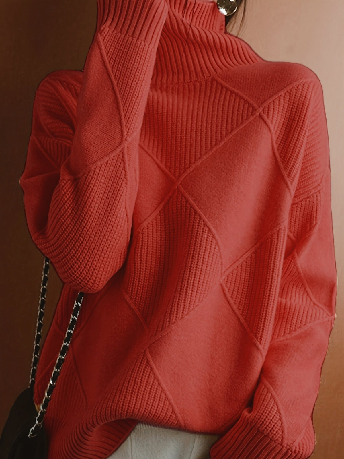 Women's textured knit turtleneck sweater with a relaxed, roomy fit