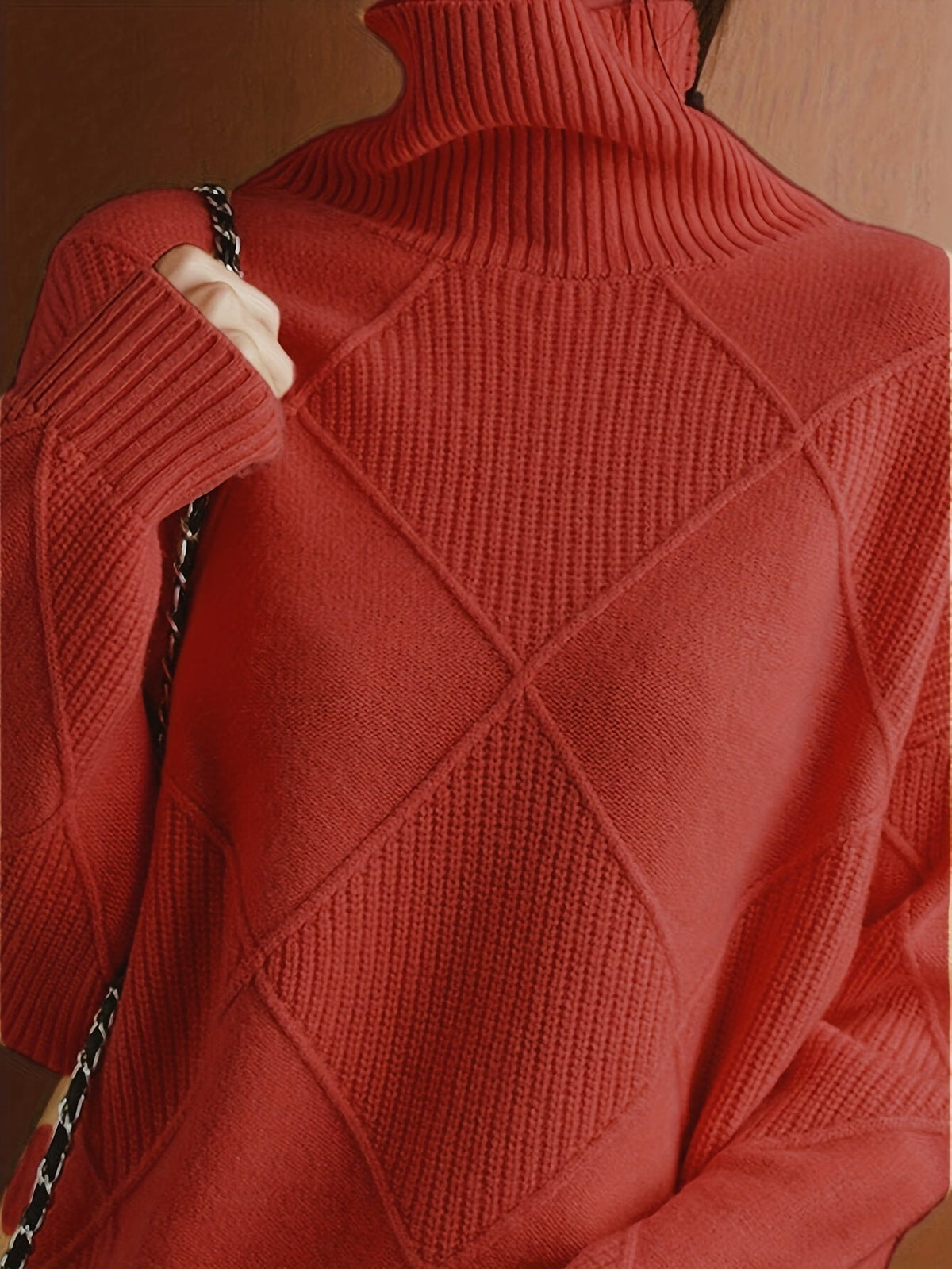 Women's textured knit turtleneck sweater with a relaxed, roomy fit