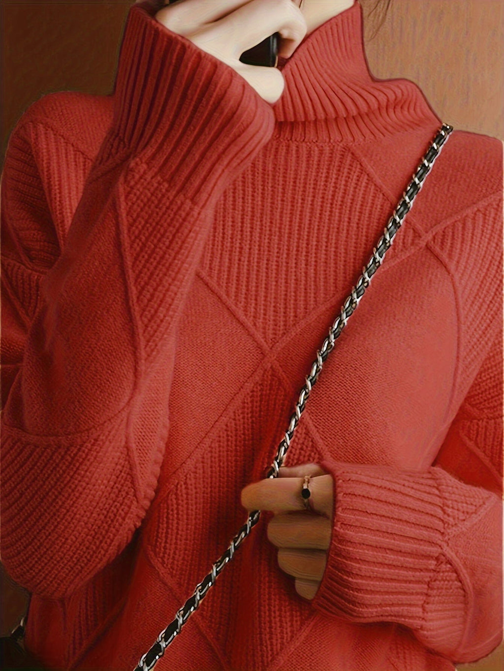 Women's textured knit turtleneck sweater with a relaxed, roomy fit