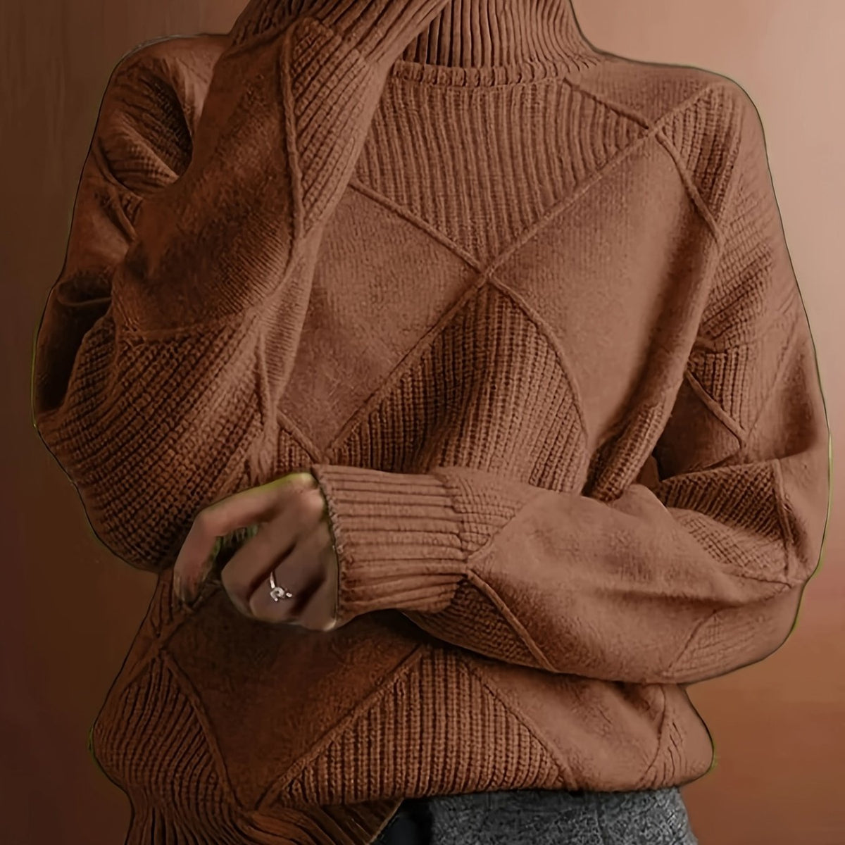 Women's textured knit turtleneck sweater with a relaxed, roomy fit