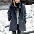 Women's hooded insulated winter coat with a relaxed fit and button front