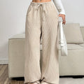 Women's apricot palazzo pants with an elastic drawstring waist