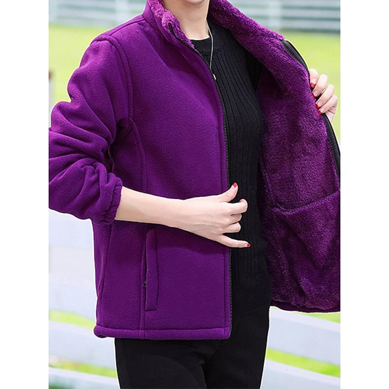 Women's fleece-lined stand collar jacket with a full zip closure