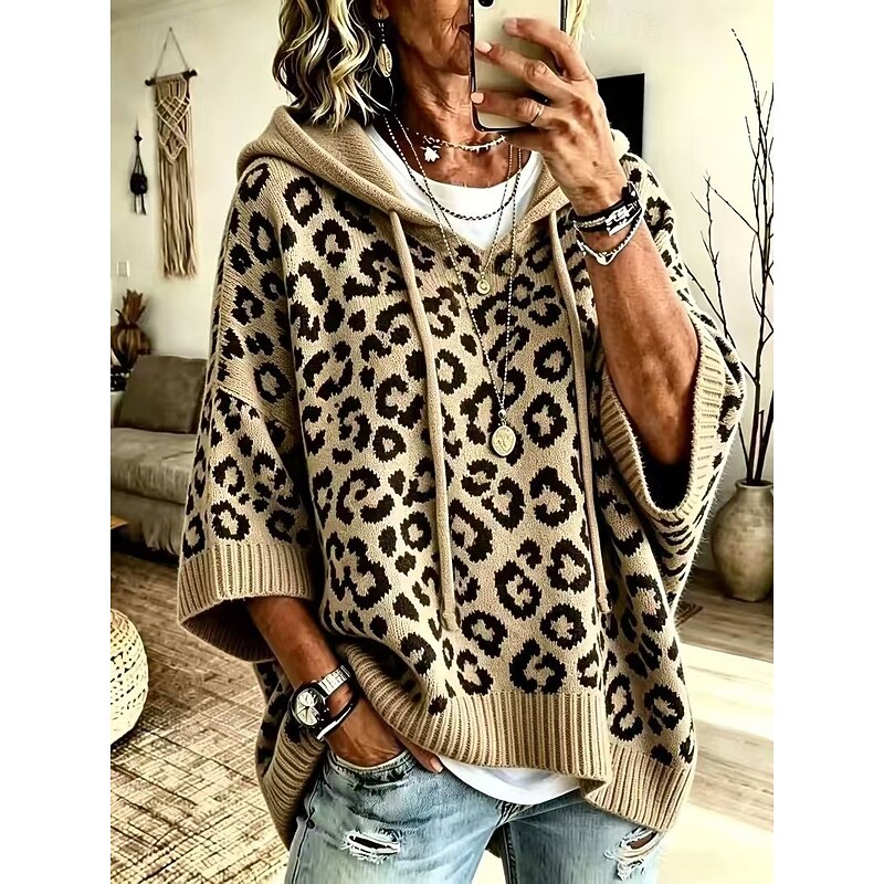 Women's animal print hooded sweater with a relaxed, graceful drape
