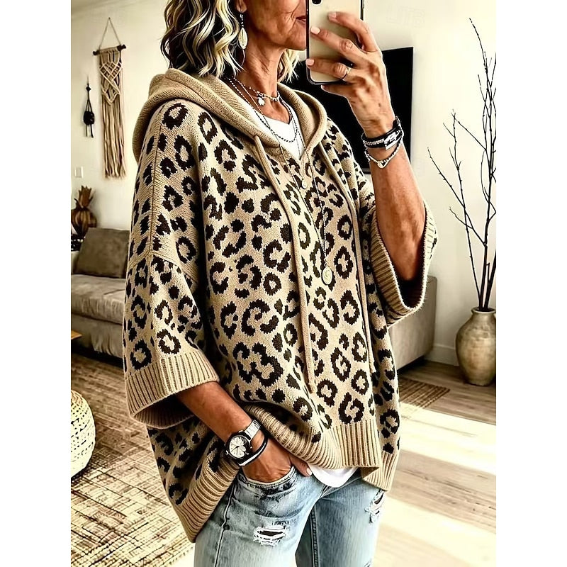 Women's animal print hooded sweater with a relaxed, graceful drape