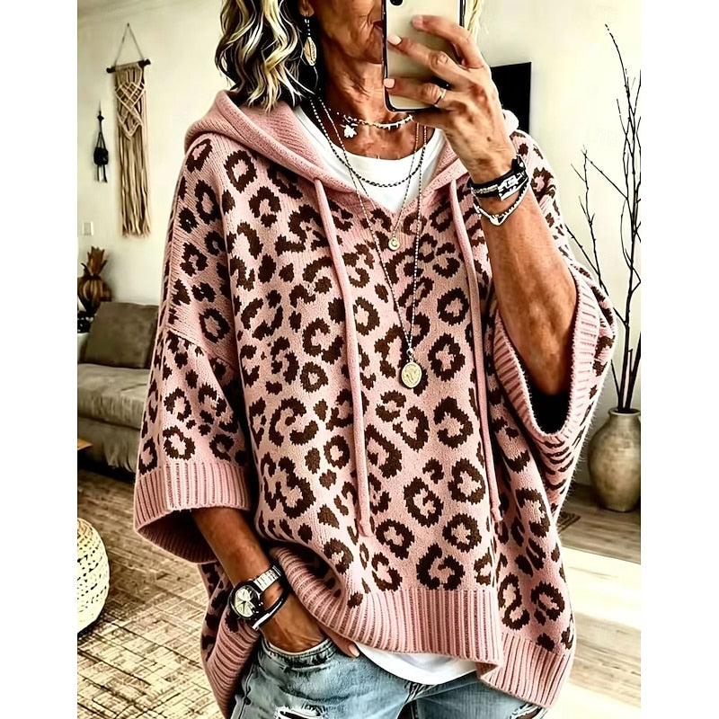 Women's animal print hooded sweater with a relaxed, graceful drape
