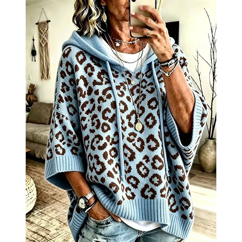 Women's animal print hooded sweater with a relaxed, graceful drape