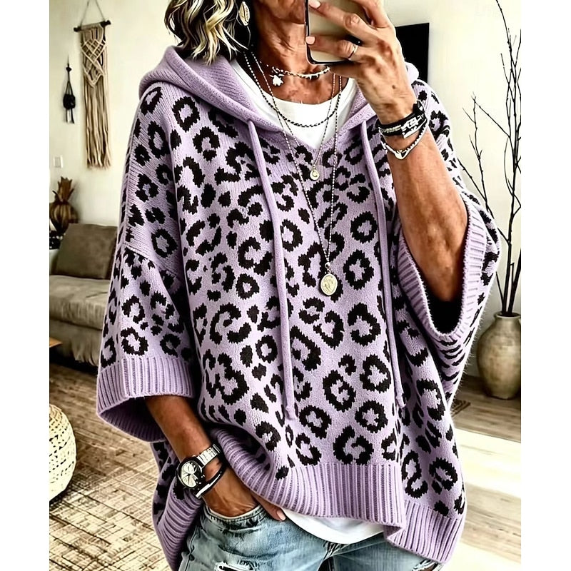 Women's animal print hooded sweater with a relaxed, graceful drape