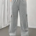 Women's gray fleece cargo joggers with adjustable drawstring waist