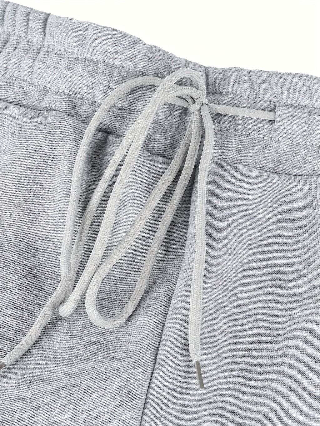 Women's gray fleece jogger pants, drawstring waist close-up