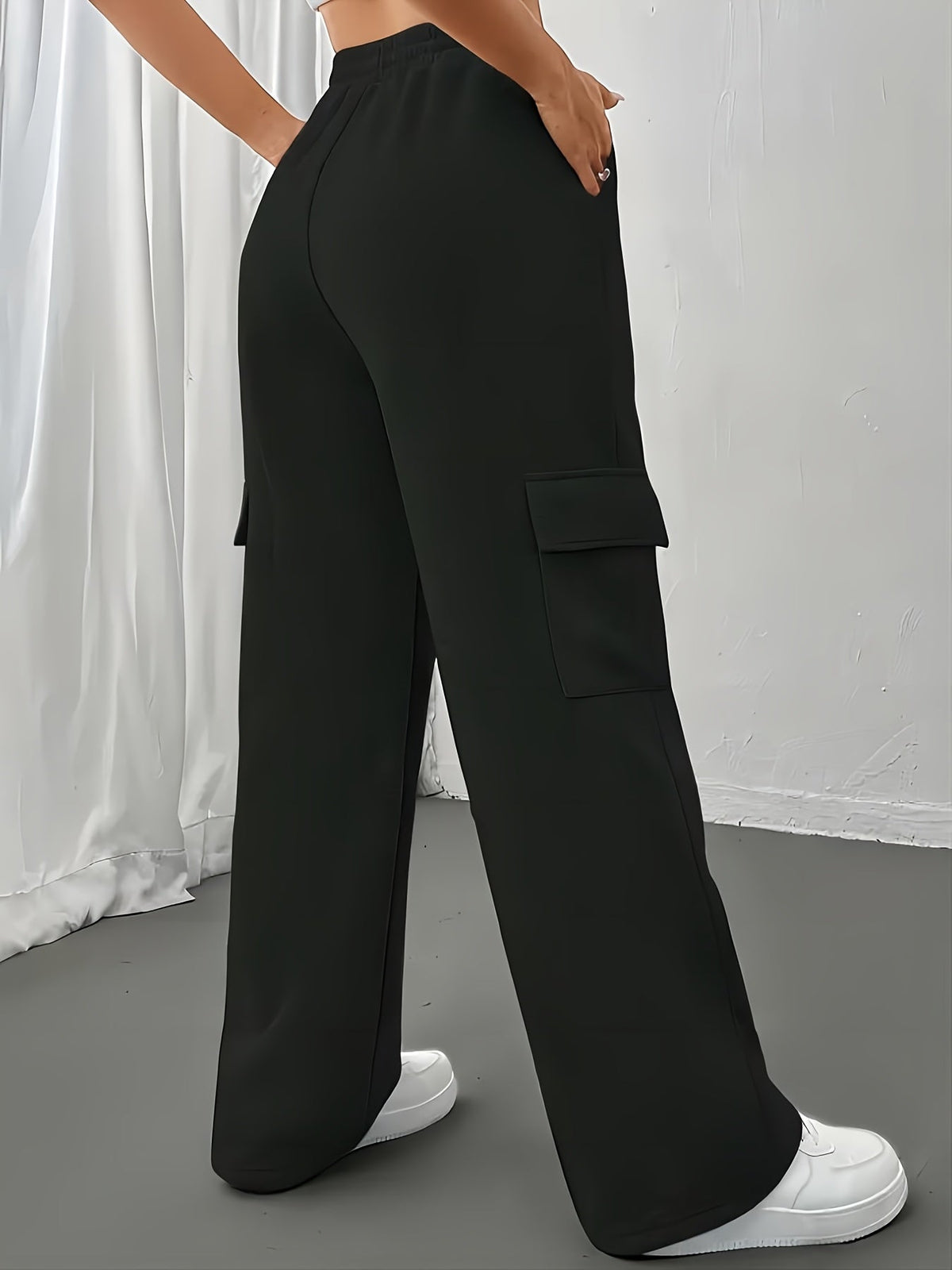 Women's black fleece cargo joggers with adjustable drawstring waist