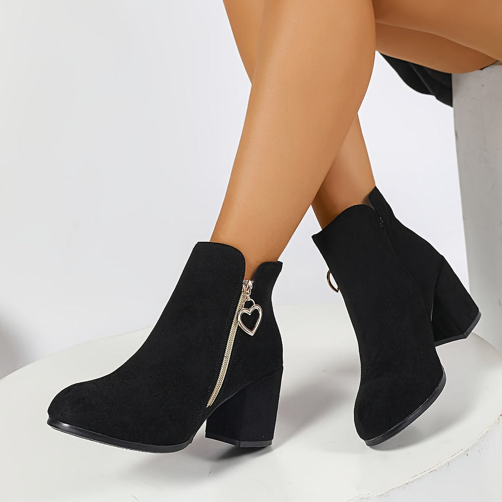 Women's black round-toe block-heel ankle boots with a side zip