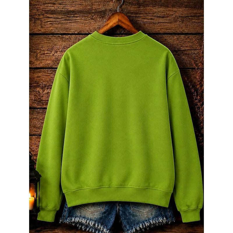 Women's green Halloween crewneck sweatshirt with witch graphic print