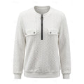 Women's cable-knit quarter-zip pullover with flap chest pockets