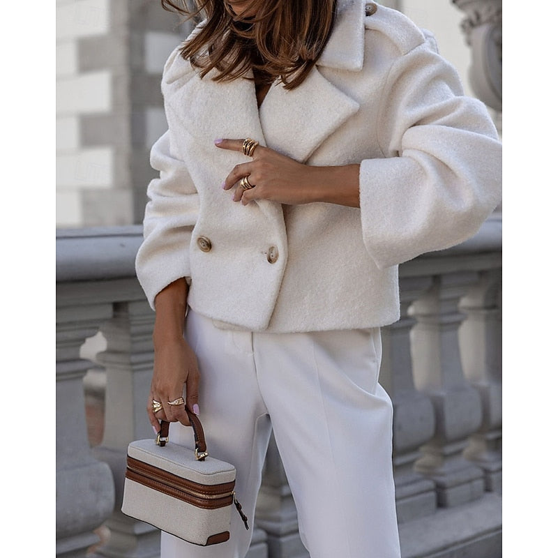 Women's white cropped coat with a turndown collar and front buttons