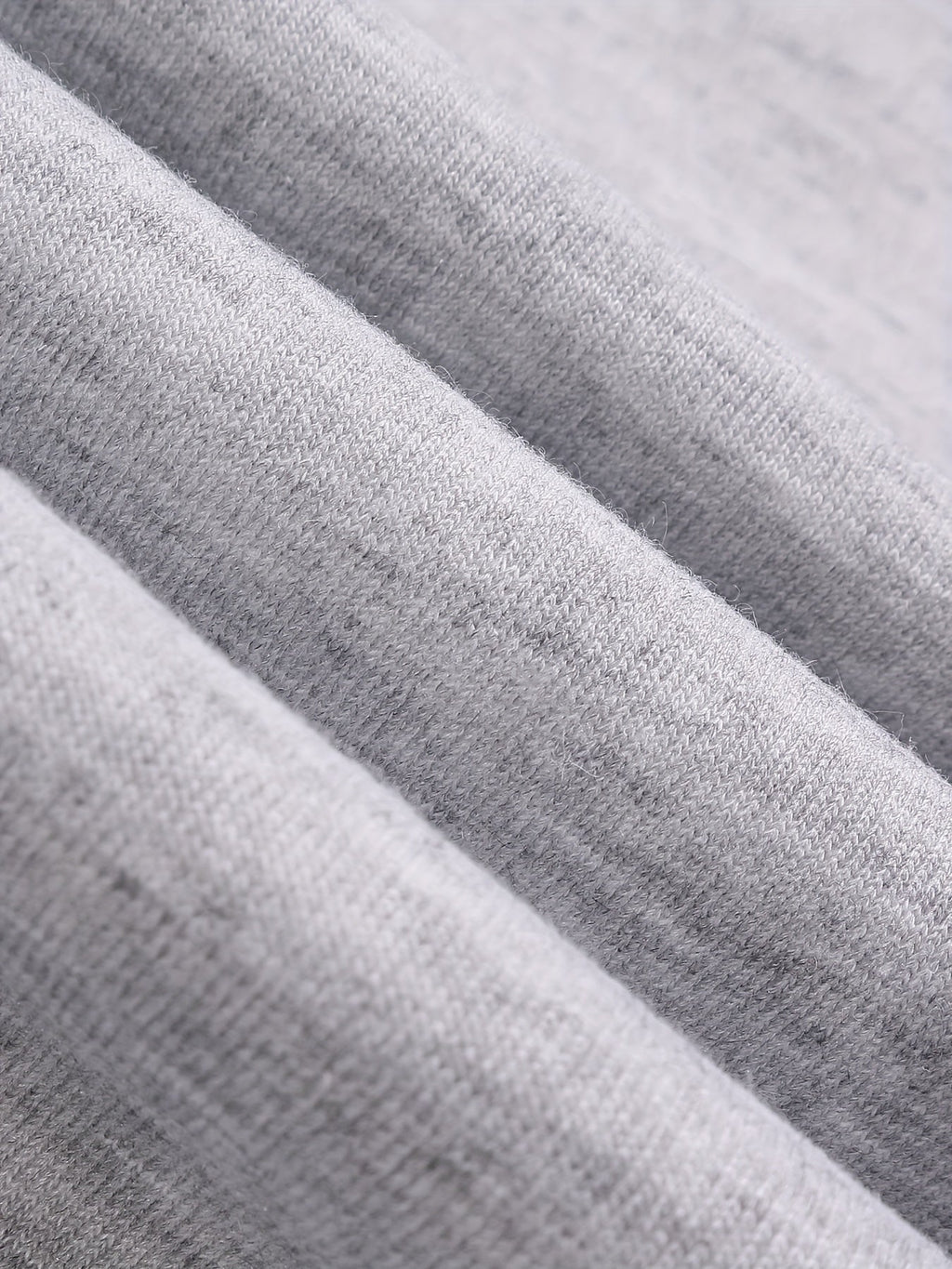 Women's light grey cargo joggers with side pockets and drawstring waist
