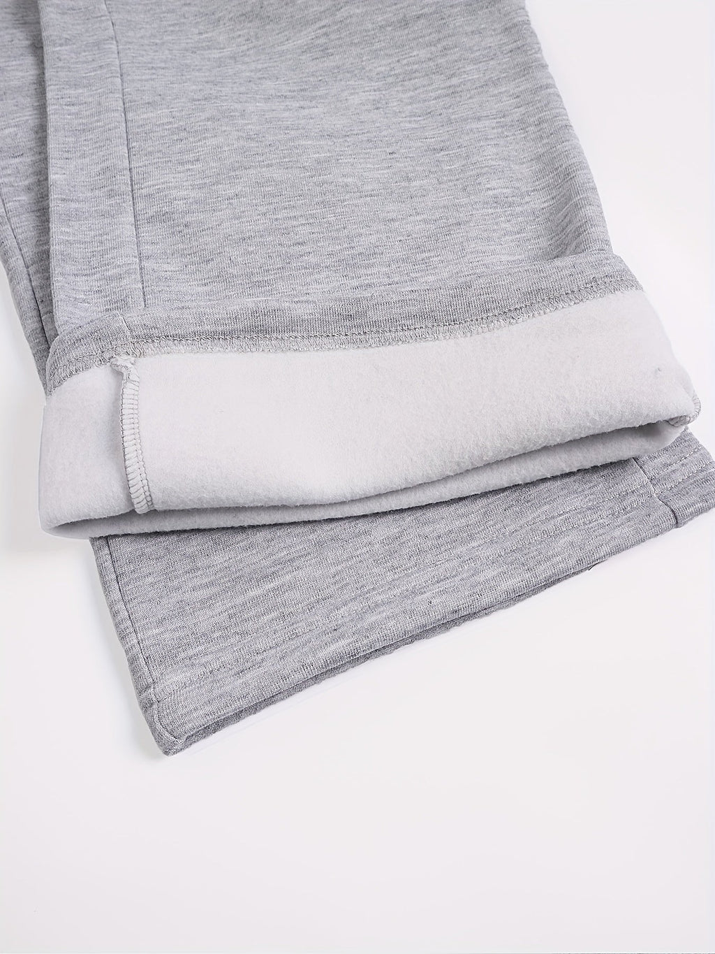Women's light grey cargo joggers with side pockets and drawstring waist