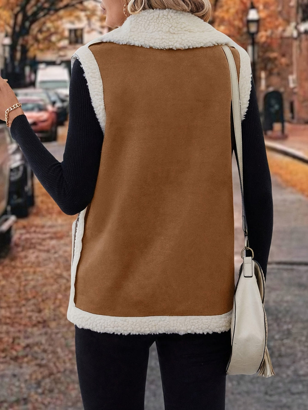 Women's rust sherpa lapel vest, back view with sherpa trim