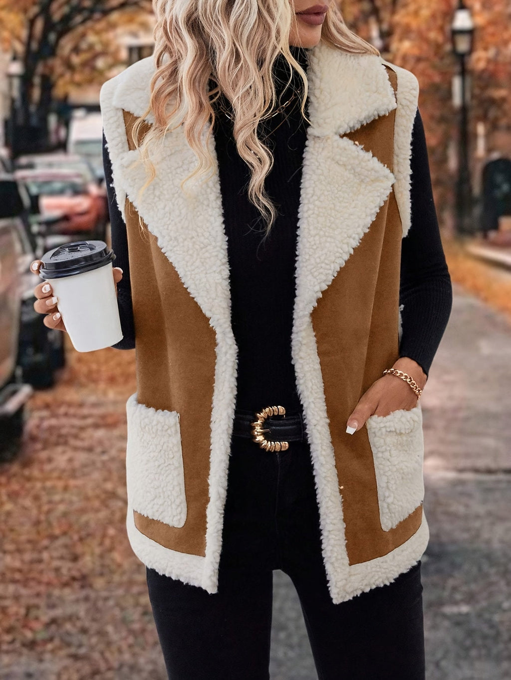 Women's rust sherpa lapel vest with open front and pockets
