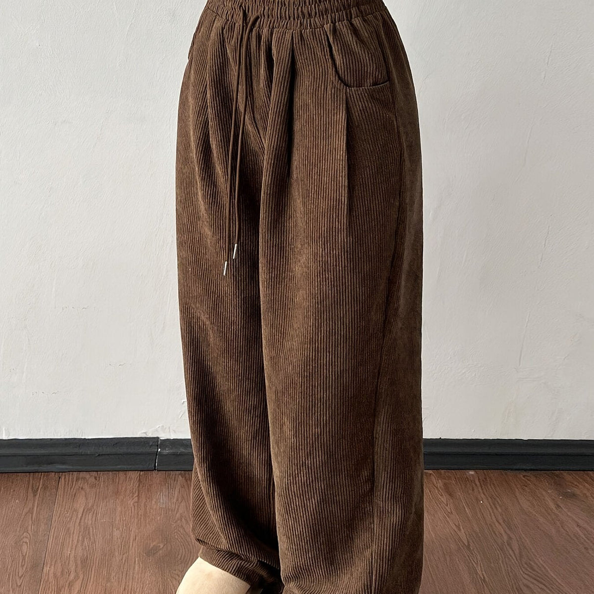 Women's dark brown wide-leg pants with an adjustable drawstring waist