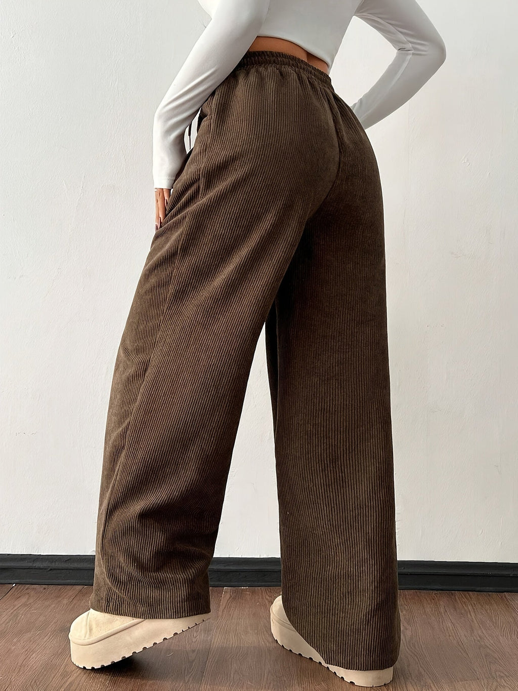 Women's dark brown wide-leg pants with an adjustable drawstring waist