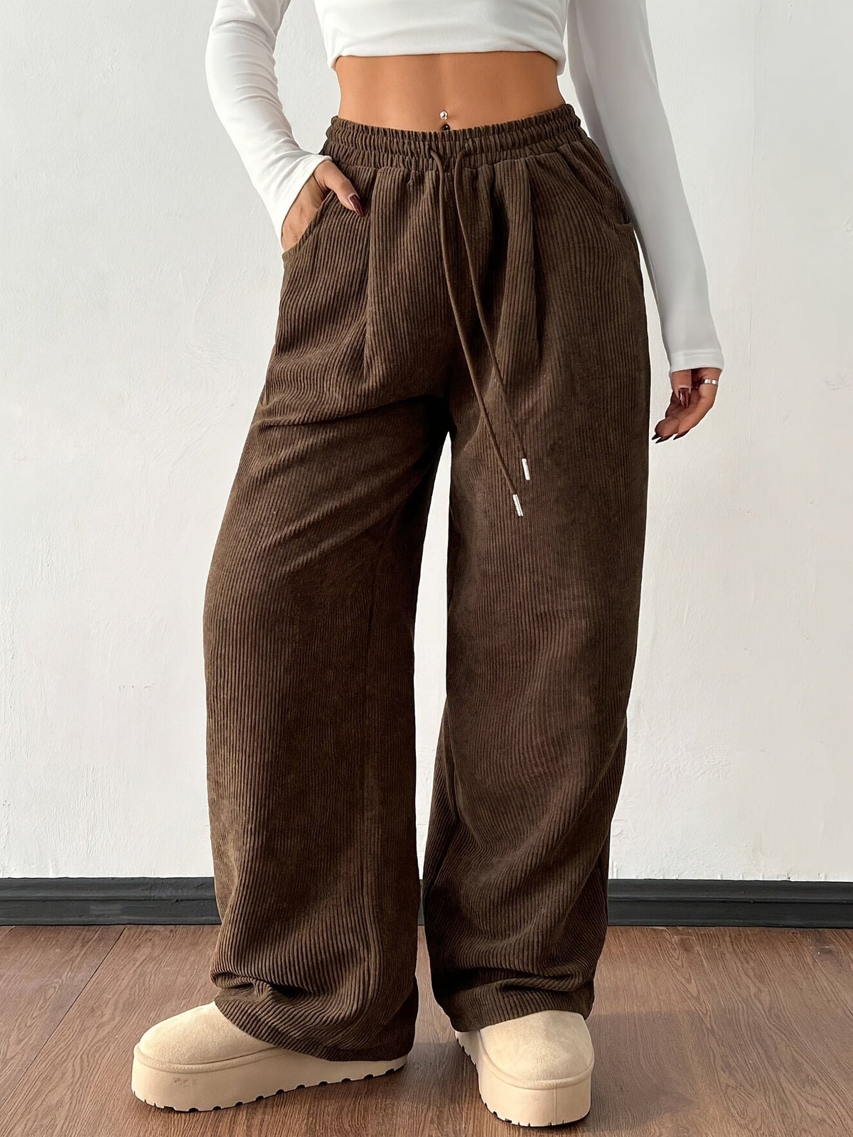 Women's dark brown wide-leg pants with an adjustable drawstring waist