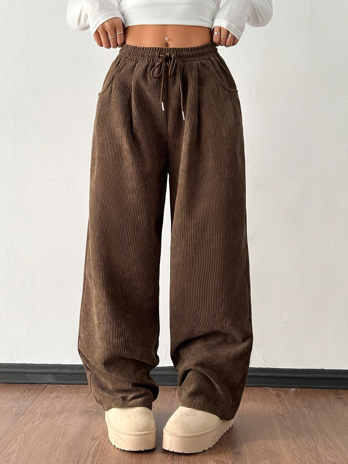 Women's dark brown wide-leg pants with an adjustable drawstring waist