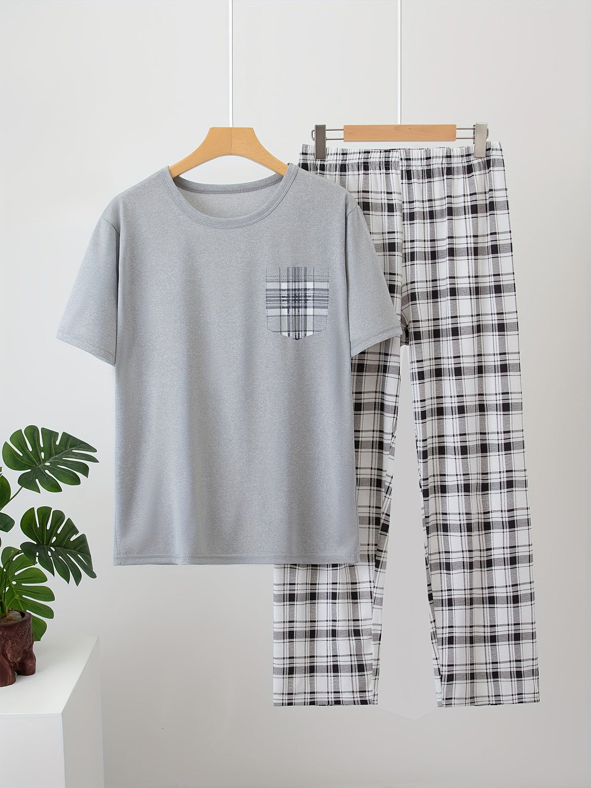Men's light grey checkered two-piece pajama set with pocket tee