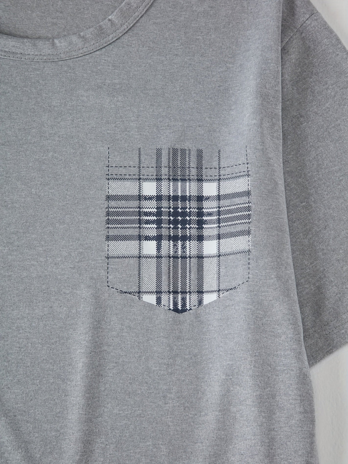 Men's light grey checkered two-piece pajama set with pocket tee