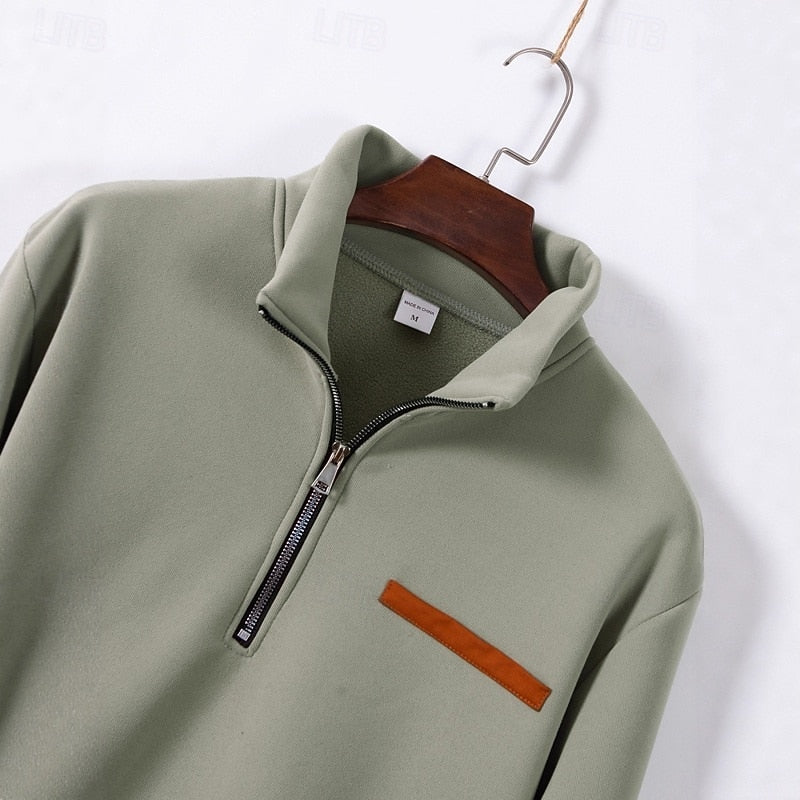 Men's quarter-zip pullover with standing collar and chest detail
