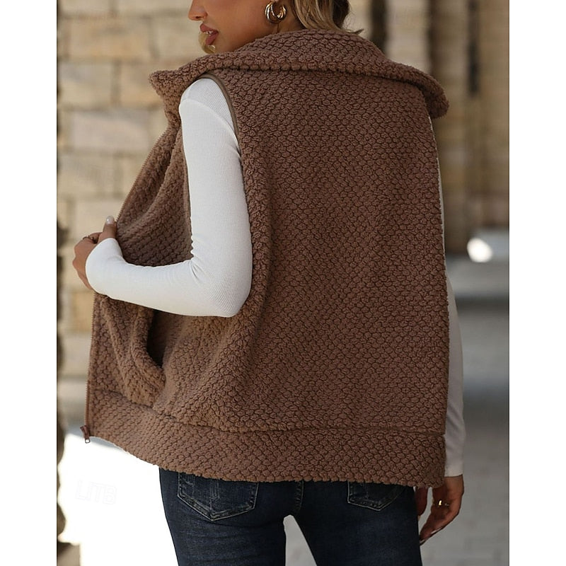 Women's apricot quilted puffer vest with zip front